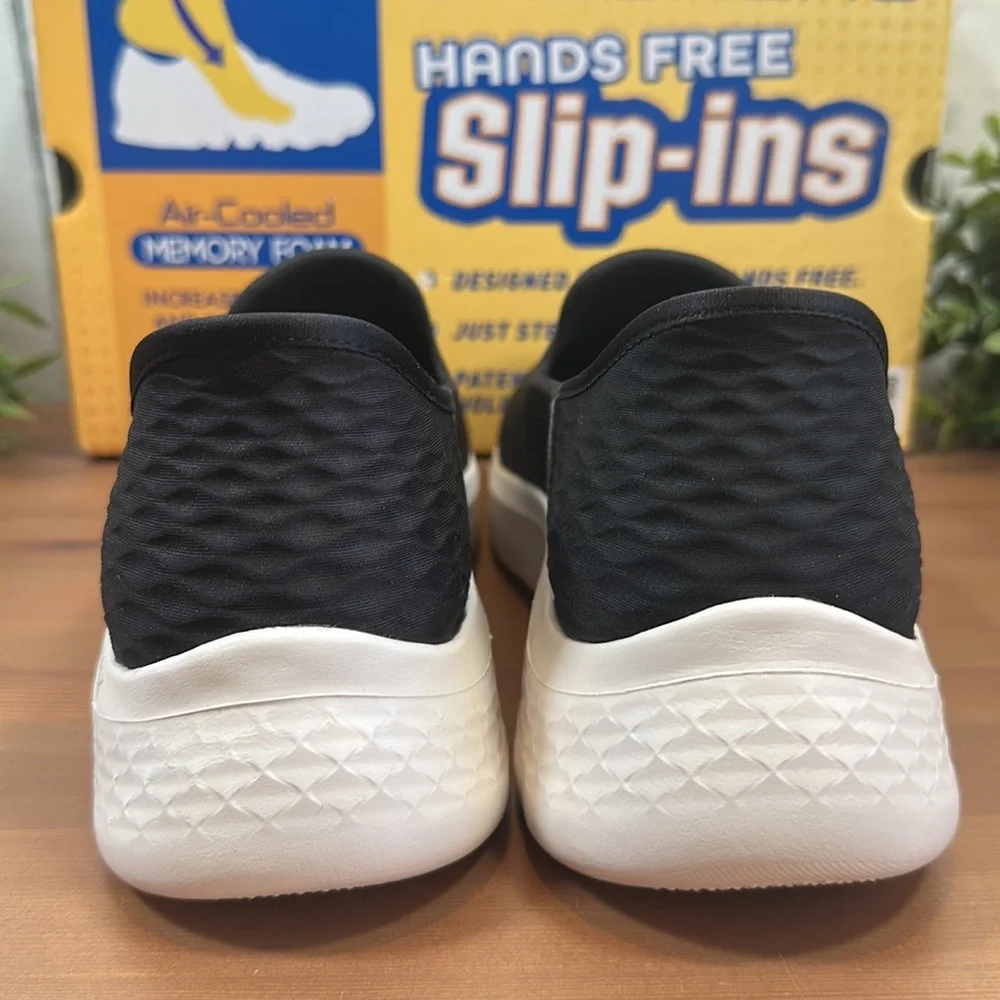 Skechers Black and White Slip-On Sneakers - Picture 7 of 11